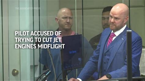 Off-duty pilot accused of trying to cut the engines on a jet midflight charged with attempted murder
